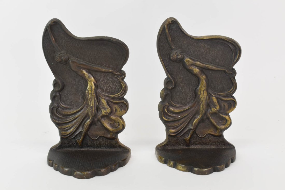 Pair of Patinated Metal Art Nouveau Dancing Flapper: Pair of Patinated Metal Art Nouveau Dancing Flapper Bookends by Jeanne Drucklieb. Used condition. 8" tall x 3" deep x 4 3/4" wide