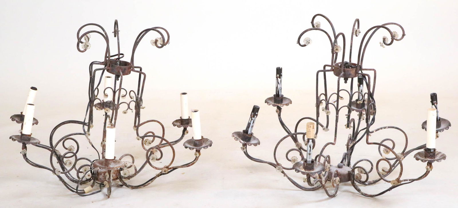 Pair of Iron and Glass Decorated Chandeliers: Vintage six light chandeliers Each appx. 18-1/2"h x 24"w