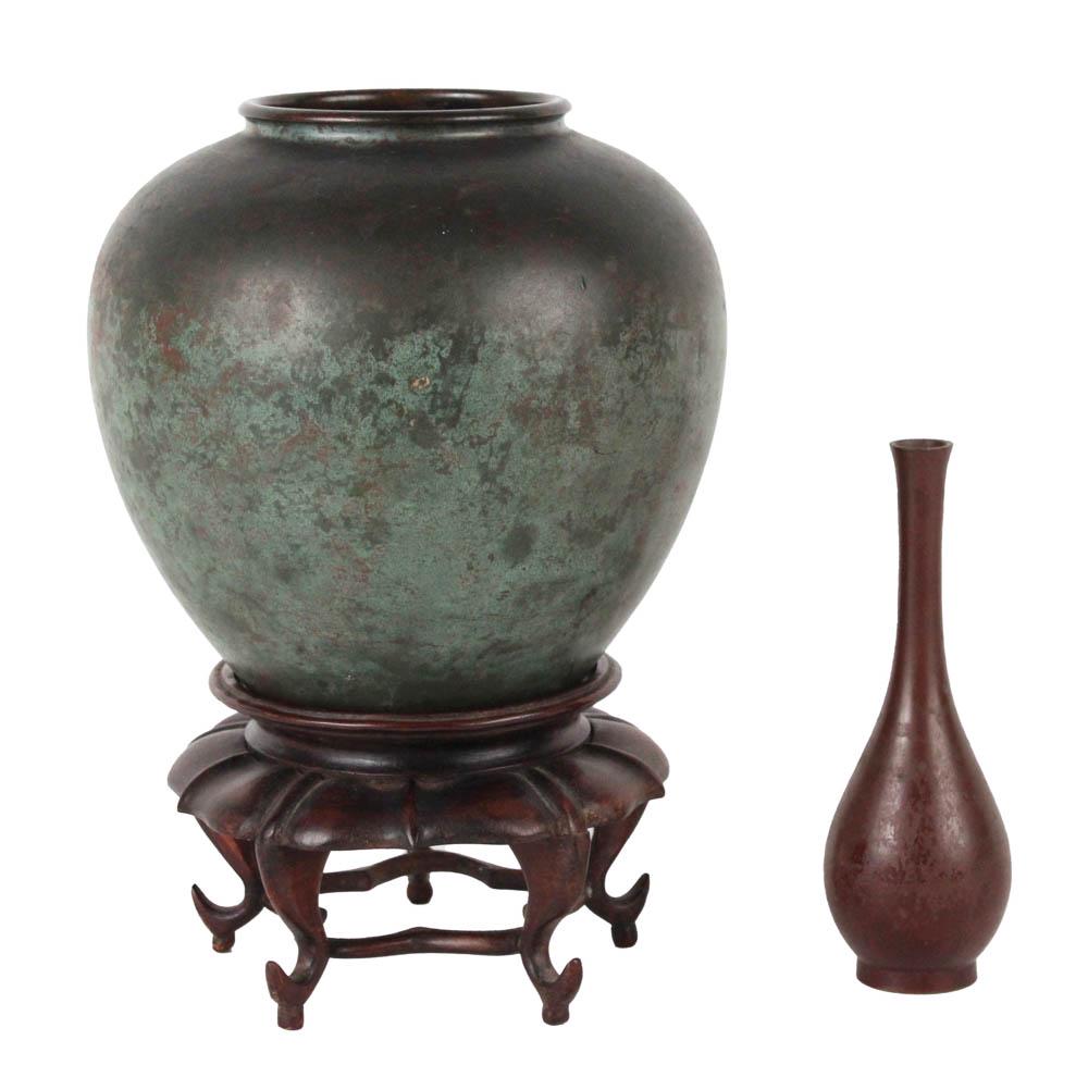 Meiji Period Japanese Bronze Vase: On hardwood lotus form base; together with a Japanese bronze bottleneck bud vase; 2 pieces total Heights from 7-1/4"h and 8"h Provenance: Property from a Warwick, NY Estate