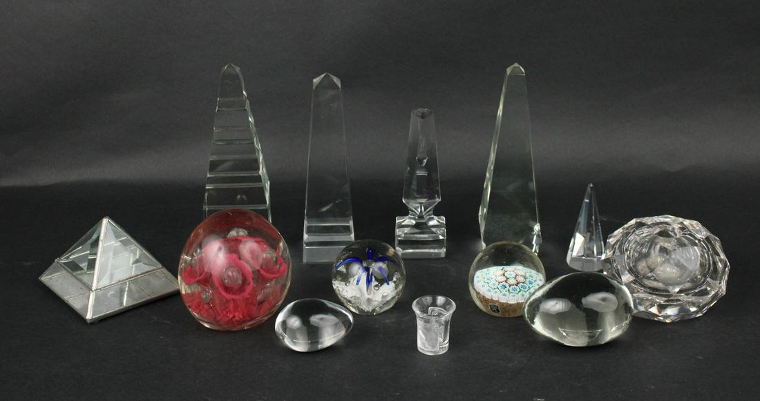 Group of Art Glass Paperweights: Together with colorless glass eggs, and colorless glass obelisks and pyramids. Scratches and wear. Provenance: Property from a Warwick, NY Estate