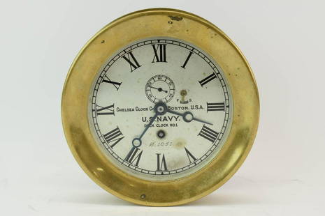 Chelsea Clock Company U.S. Navy Deck Clock No. 1: Chelsea Clock Company U.S. Navy Deck Clock No. 1 (Stamped Serial Number 107894 on back) with second hand, blue minute and hour hands, engraved roman numerals, Fast Slow regulatory lever, and brass cas