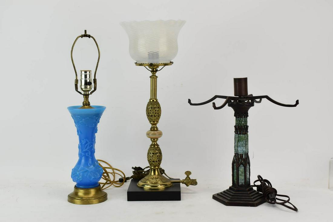 Three Lamps: Three Lamps, the first bronze with applique mosaic glass, the second blue molded glass, the third gilt metal with a frosted glass open shade Used condition, wear, worn Heights from 13-3/4"h to 20"h