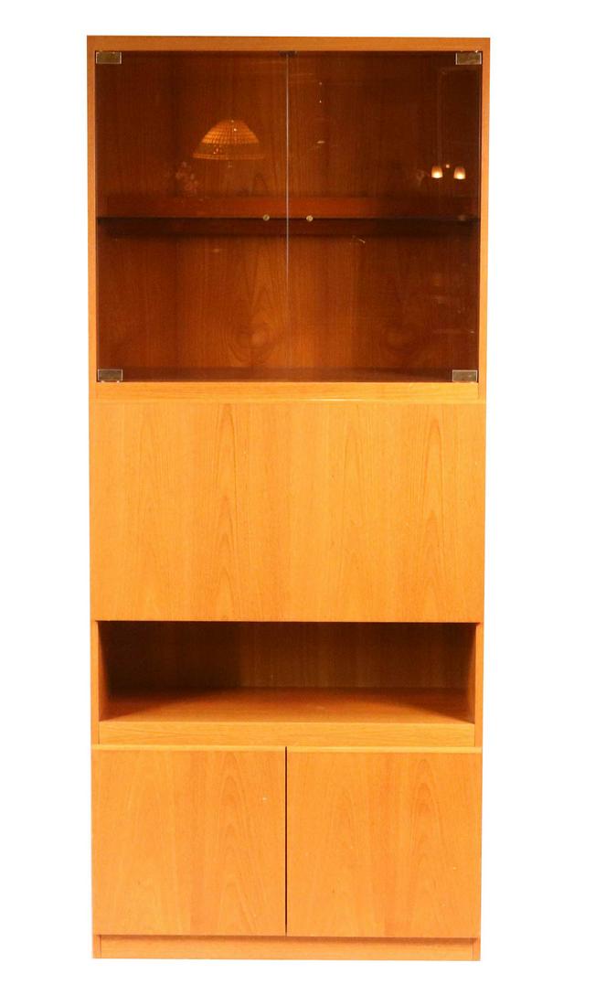 Danish Modern Teakwood Fall Front Bar: Danish Modern Teakwood Fall Front Bar 20th/21st C., with glass doors above fall front Stains to lower side 6'5-1/4"h x 32-1/2"w x 17"d