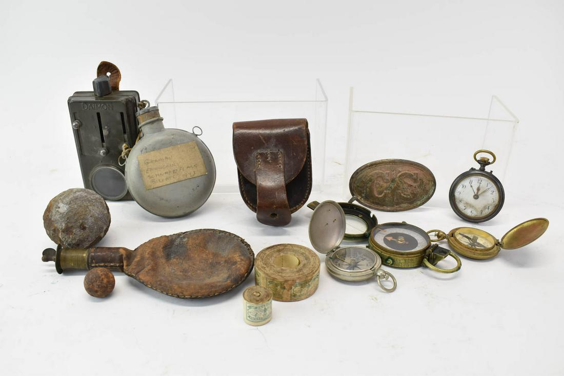 Group of Military Ephemera: Group of Military Ephemera, including German Third Reich army correspondence stamps; a metal flask with affixed cloth label reading "Bizerte 1943"; two Wittnauer World War II compasses; an unidentifie