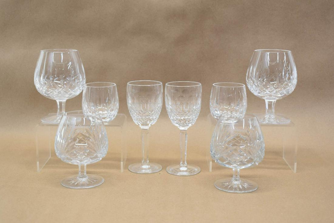Group of Crystal Glassware: Group of Crystal Glassware, including two Stuart votive holders, two Rogaska brandy glasses each engraved "Baltusrol 1992", two Waterford wine goblets, and two Waterford brandy glasses, 8 pieces total