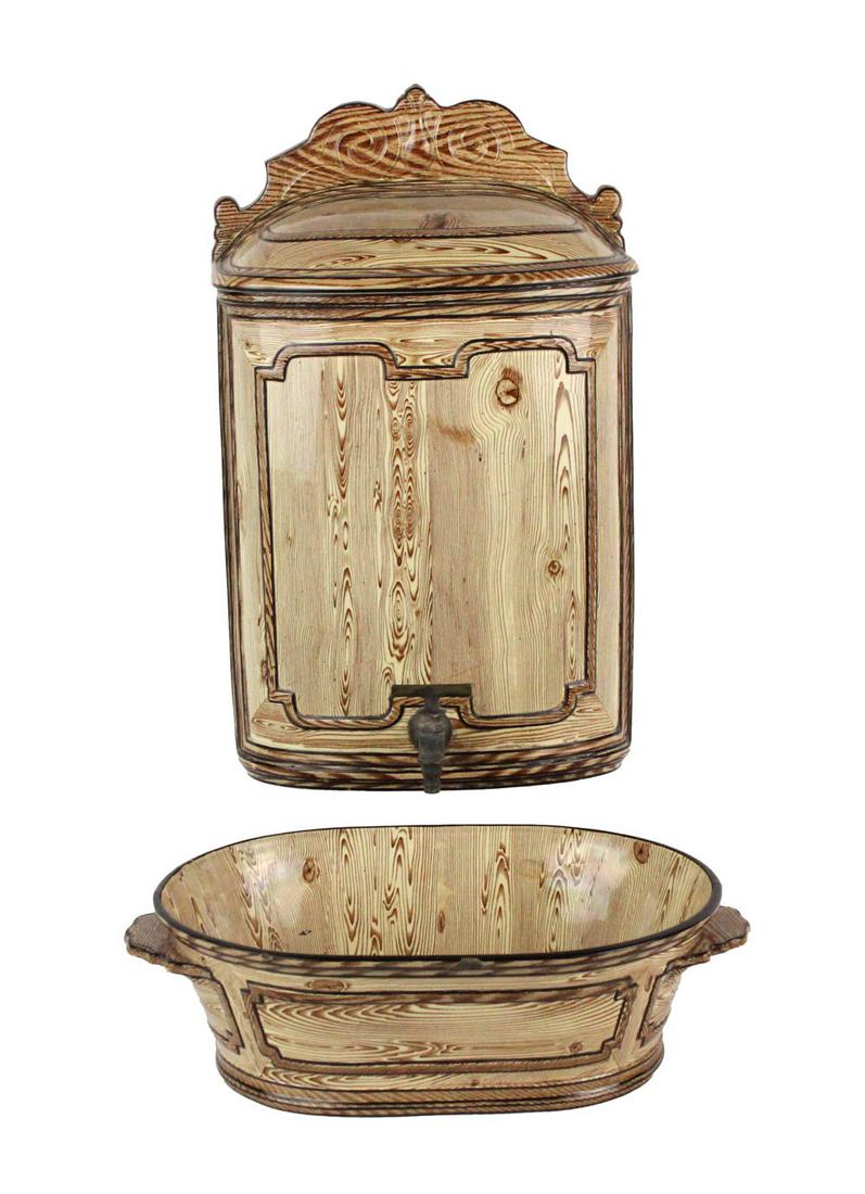 Creil et Montereau L & Cie Cistern and Basin: 19th C., with Creil et Montereau L & Cie backstamp on underside along with "Modele Depose" backstamp Cistern: 17"h x 10-1/2"w x 7-1/2"d (including faucet) Basin: 4-1/8"h x 14-1/2"w