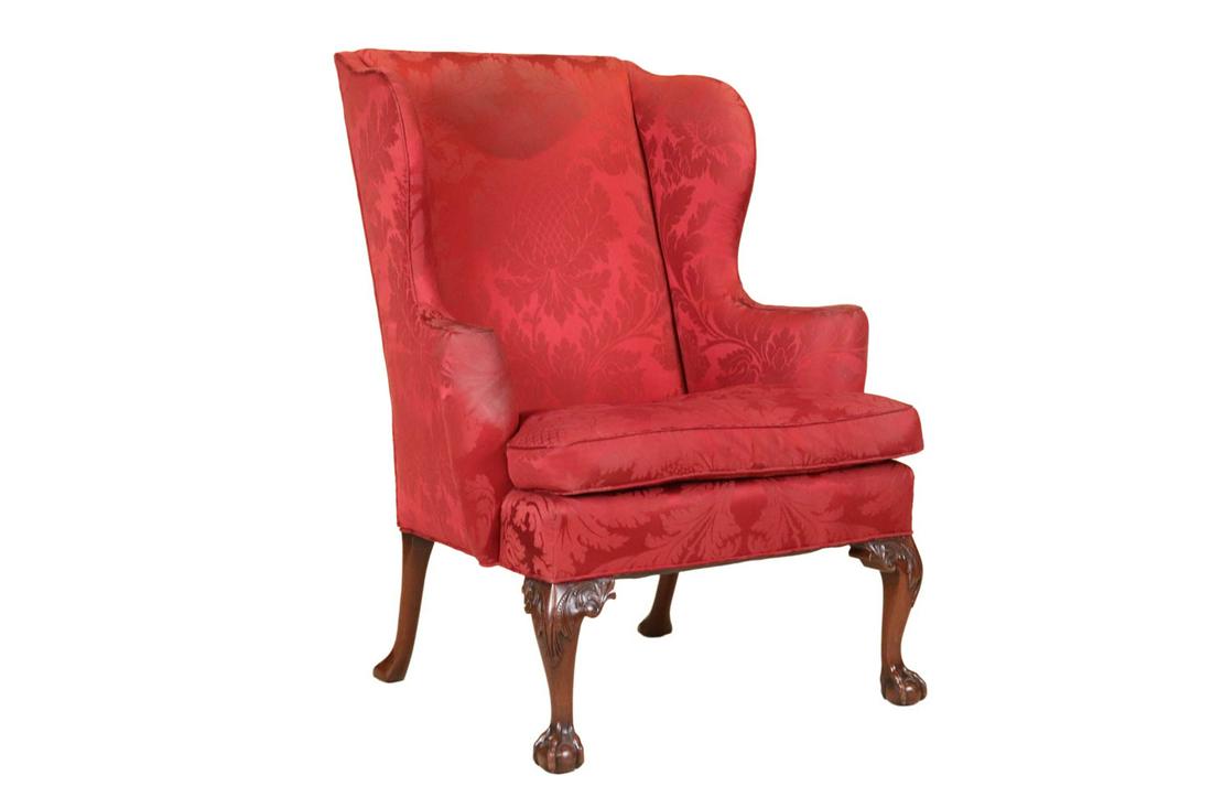 Chippendale Style Mahogany Wing Chair: English taste, 19th/20th C., with red damask upholstery. Stains and wear. 44-1/4"h x 32-1/2"w x 29"d