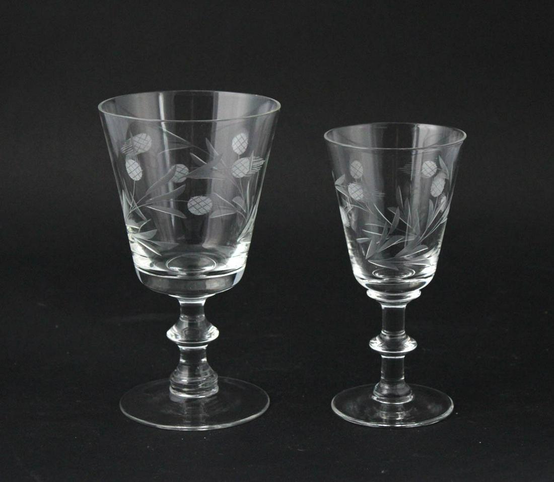 Group of Thistle Pattern Crystal Stemware: Comprising 12 wine glasses and 9 sherry glasses, appears to be unmarked Heights from 5-5/8"h to 6-1/4"h
