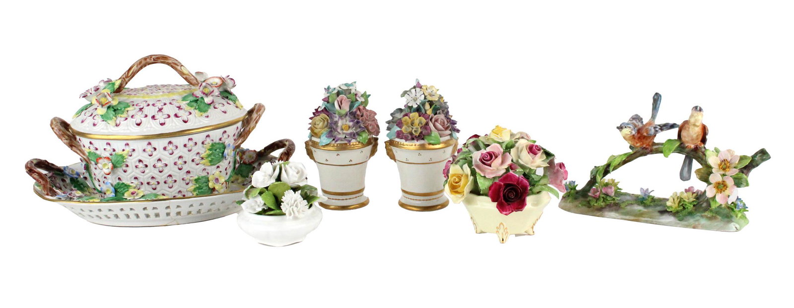 Mottahedeh Porcelain Floral Basket and Tray: Design no. S.6153, together with four ceramic floral bouquets including two by Mottahedeh, one by Coalport, and one by Adderley, and a Crown Staffordshire J T Jones bone china bluebird figural, 7 piec
