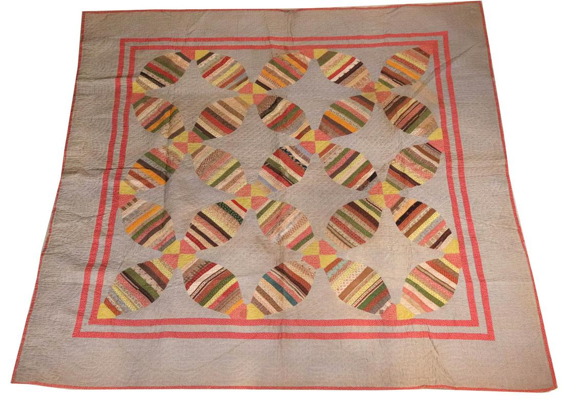 Pieced and Applique Cotton Quilt: American, 19th/20th C. Wear, stains, losses. Provenance: Property from the Collection of Maggie Cohen, New York City