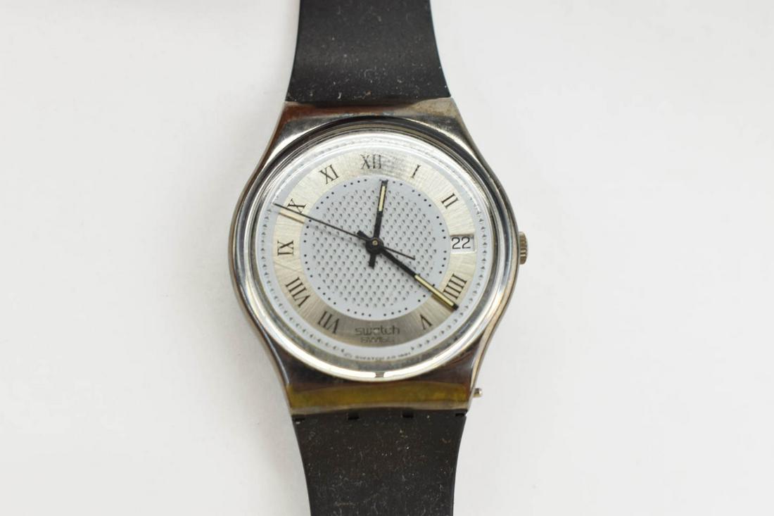 Swatch Swiss AG 1991 2202 30mm Black Watch: Swatch Swiss AG 1991 2202 30mm Black Watch, patented water resistant 7755, black rubber band Good used condition.