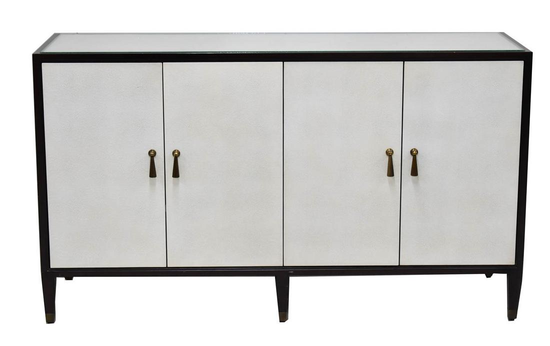 Evie Currey & Co Shagreen Style Credenza: Evie Shagreen Style Credenza by Currey & Co., with four door cabinet with glass top, and decorative brass hardware Used condition 34-1/2"h x 60"l x 20"d
