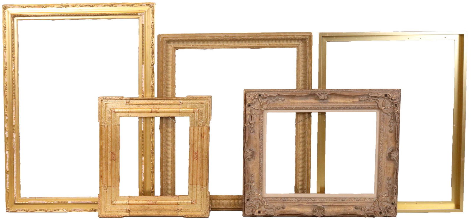 Five Assorted Picture Frames: All giltwood, some carved and some modern. Losses, surface distress. Largest: 35"h x 25"w