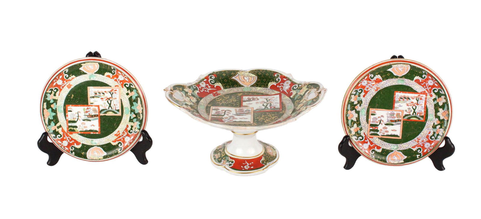 Three Mason's Ironstone Table Articles: Comprising a compote and two trivets, "Chinese Double Landscape" pattern. Some wear. Compote: 5"h x 10-1/4"h x 8-3/4"d Trivets: each 3/4"h x 7"dia Provenance: Doyle New York, Sale 10FD05, July 22nd, 2