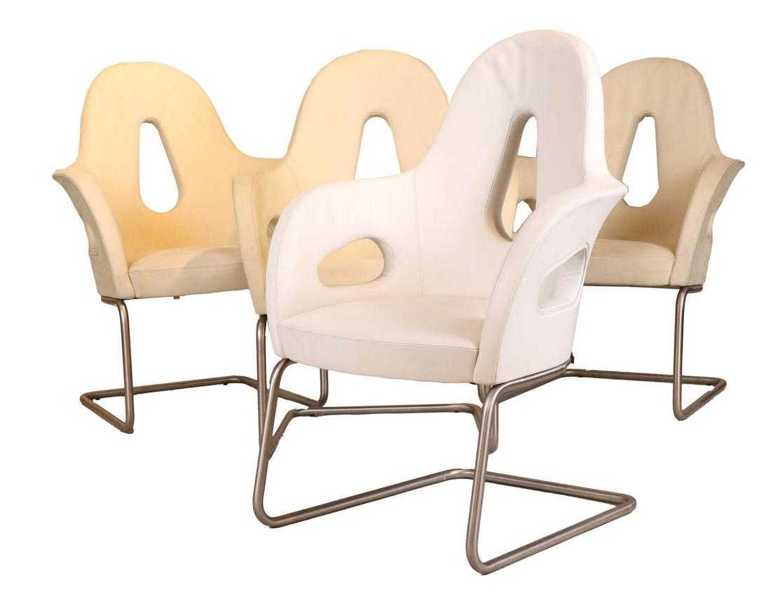 Four Giorgetti "Teodora" Armchairs: Designed by Massimo Scolari for Giorgetti, 20th/21st C., comprising three in suede upholstery and one in white leather upholstery Each appx. 38-3/4"h x 23-1/8"w x 24"d, seat height 17"d