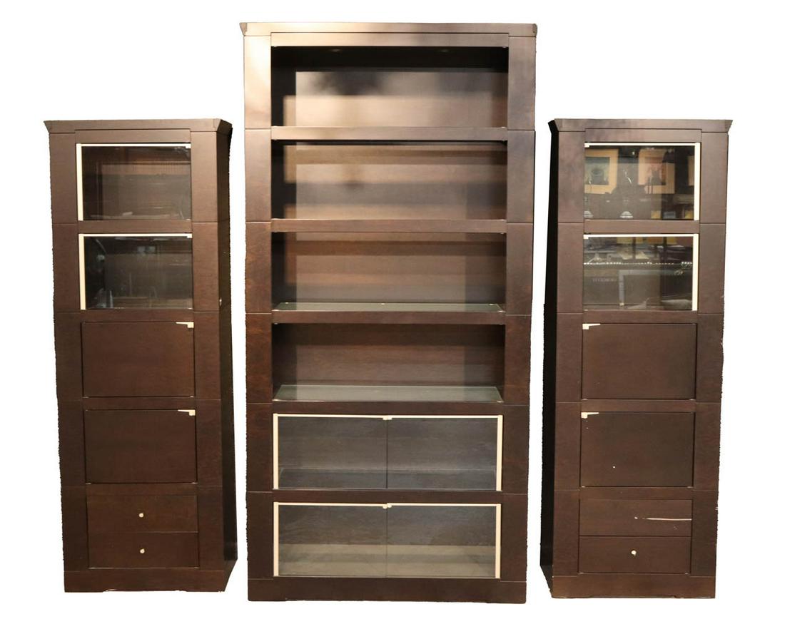Giorgetti Three-Piece Shelving Set: Designed by Chi Wing Lo for Giorgetti, 20th/21st C., comprising a central unit with four shelves and two rows of cabinets, and two side cabinets with five doors each Central unit: appx. 7'5-1/8"h x 43
