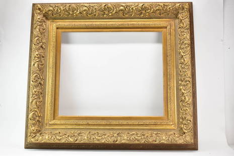 Large Gilt Carved Picture Frame: Large Gilt Carved Picture Frame. Used condition, outside size 33 3/4" x 37 1/2", interior dimension 19 1/4" x 23"