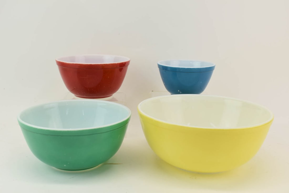Pyrex Graduated Set of Multi-Color Mixing Bowls: Pyrex Graduated Set of Multi-Color Mixing Bowls. Used condition, minor wear. Largest bowl measures 10 1/2" dia x 4 1/2" tall, smallest bowl 5 3/4" dia x 3 1/4" tall