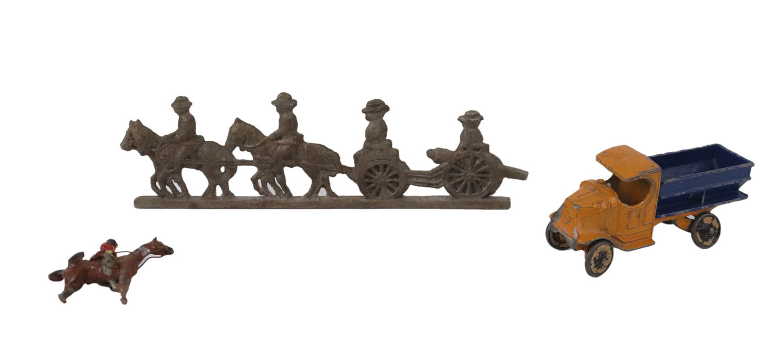 Tootsie Toy Yellow and Blue Truck: Together with a painted lead soldier on horseback, and a metal fragment of cannon being pulled by soldiers on horseback. Losses. Truck: 3"l