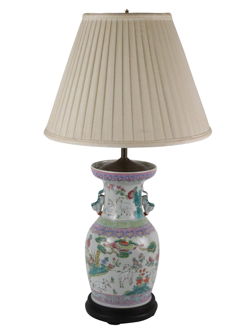 Famille Rose Lug-Handle Porcelain Vase: Chinese, 19th/20th C. Electrified and fitted as a lamp. Vase: 14"h x 7-1/2"d Overall: 30"h Provenance: Property from a Distinguished New Jersey Gentleman