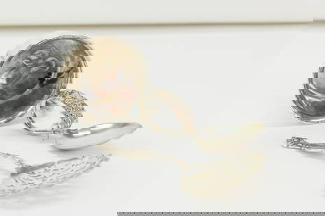Towle Sterling Silver Squirrel Christening Mug: Towle Sterling Silver Inside Squirrel Decorated Christening Mug. Together with a Sterling Silver S. Kirk baby spoon and a Sterling silver nut spoon. Used condition, tarnish dents. Combined weight Appr