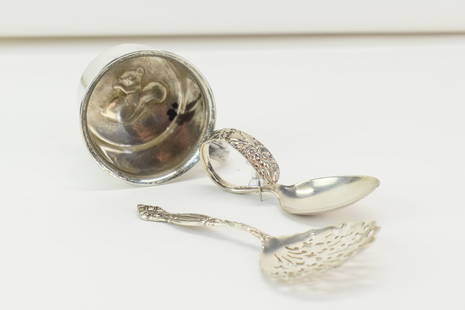 Towle Sterling Silver Squirrel Christening Mug: Towle Sterling Silver Inside Squirrel Decorated Christening Mug. Together with a Sterling Silver S. Kirk baby spoon and a Sterling silver nut spoon. Used condition, tarnish dents. Combined weight