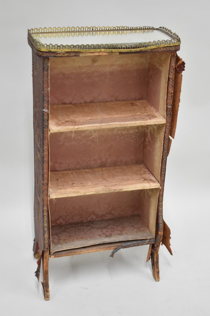 Antique Recency Style Tooled Leather Vanity Shelf: Antique Recency Style Tooled Leather Vanity Shelf. Having a mirrored top with brass gallery. Used condition, wear, worn, losses 32" tall x 15 1/4" x 10"