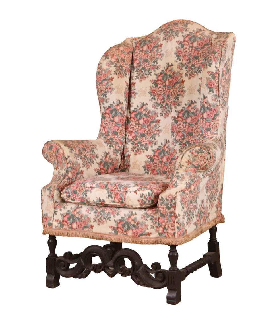 Baroque Style Carved Oak Upholstered Wing Chair: In the English tradition, 20th C. 52"h Provenance: Property from a Private Philadelphia and UK Family Collection
