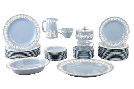 Wedgwood & Barlaston Queensware Dinner Service: English, 20th C. comprising, an oval serving platter, pair of oval serving dishes, a pitcher, a covered candy bowl, 8 dinner plates, 9 teacups and saucers, 10 bread plates, and 12 luncheon plates. 53