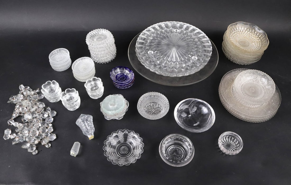 Group of Pressed and Molded Glass Table Articles: Including, plates, trays, bowls, bobeches, and lids. Losses, wear, surface distress. Largest: 14"dia. Provenance: Property from a Private Princeton, NJ Collection