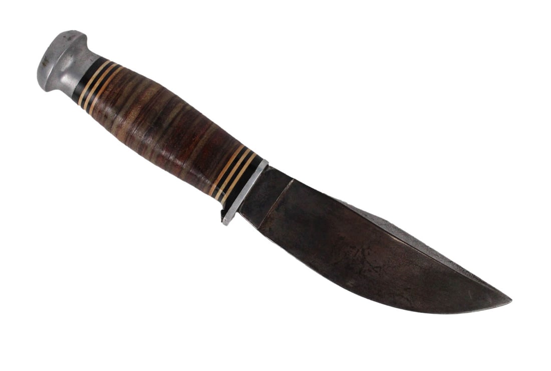 Jean Case Knife: Leather grommet handle with steel pommel and skinner blade, signed "Cutco" and "Little Valley NY", lacking sheath; together with a larger skinning knife with leather grommet handle and matching sheath