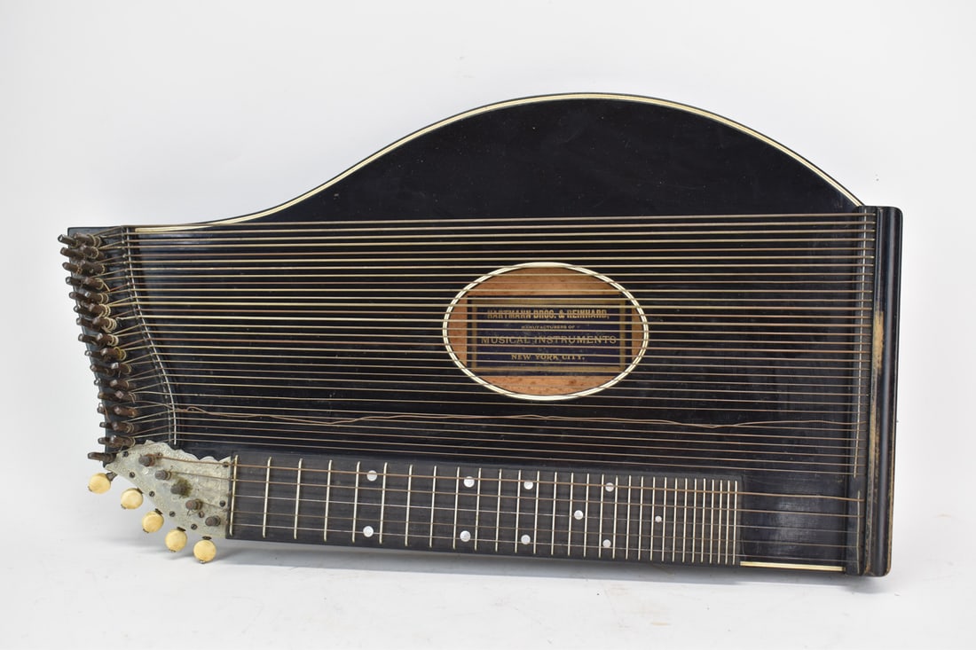 Vintage Hartmann Bros + Reinhard Musical Zither: Vintage Hartmann Bros + Reinhard New York City Musical Zither in fitted case. Used condition, wear, worn. case size 24 1/2" long x 14 3/4" x 3"