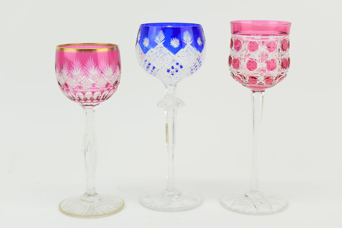 Group of 3 Bohemian Cut Crystal Tall Wine Glasses: Group of 3 Bohemian Cut Crystal Tall Wine Glasses comprising two cranberry cut to clear and one cobalt cut to clear in varying patterns and heights; used condition; tallest measures approximately 8 1/