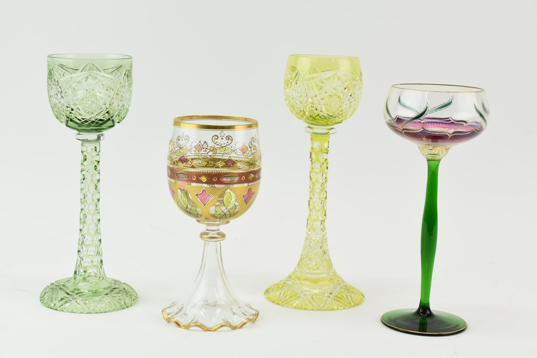 Group of 4 Decorative Wine Glasses: Group of 4 Decorative Wine Glasses comprising two crystal, one green cut to clear and one yellow cut to clear, one handblown gilt decorated glass and one hand painted and handblown glass with green st