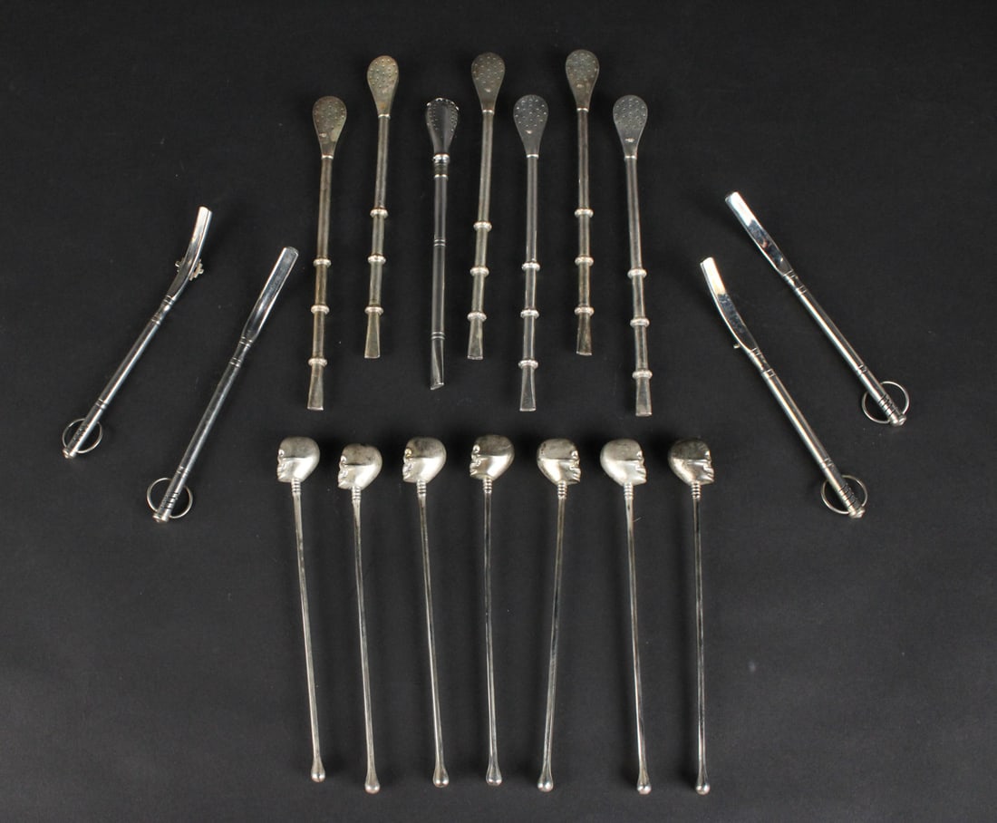 Seven Skull and Bone Silver Metal Stirrers: Together with silver plated stirrers.