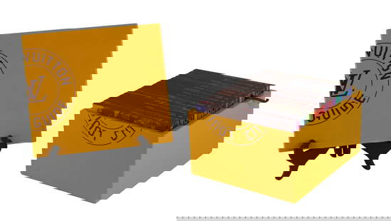 Louis Vuitton City Guide Boxed Set: With 16 guide books in yellow box, 15th edition. 6"h x 10-1/2"w x 9-1/4"d No guarantees made about the number of books in a lot or condition of books. All books sold “as is.” No returns or ref