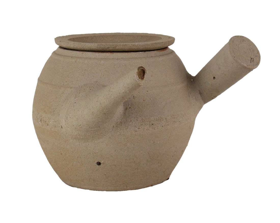 Chinese Herbal Medicine Clay Teapot: Chinese Herbal Medicine Clay Teapot. Together with an unglazed metal-mounted pottery covered teapot, 2 pieces total Some chips, wear, surface distress. 6-1/4"h and 9"h
