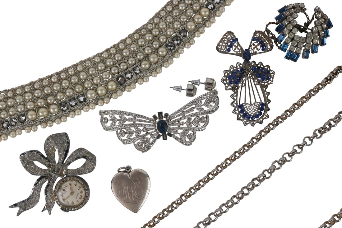 Bonwit Teller Pearl & Crystal Woven Collar: Circa 19402, bib collar approx. 16"l on adjustable cord with pearl tassel ends. Together with an imitation diamond lapel watch pin, three vintage pins, including a butterfly, three pair of large faux 