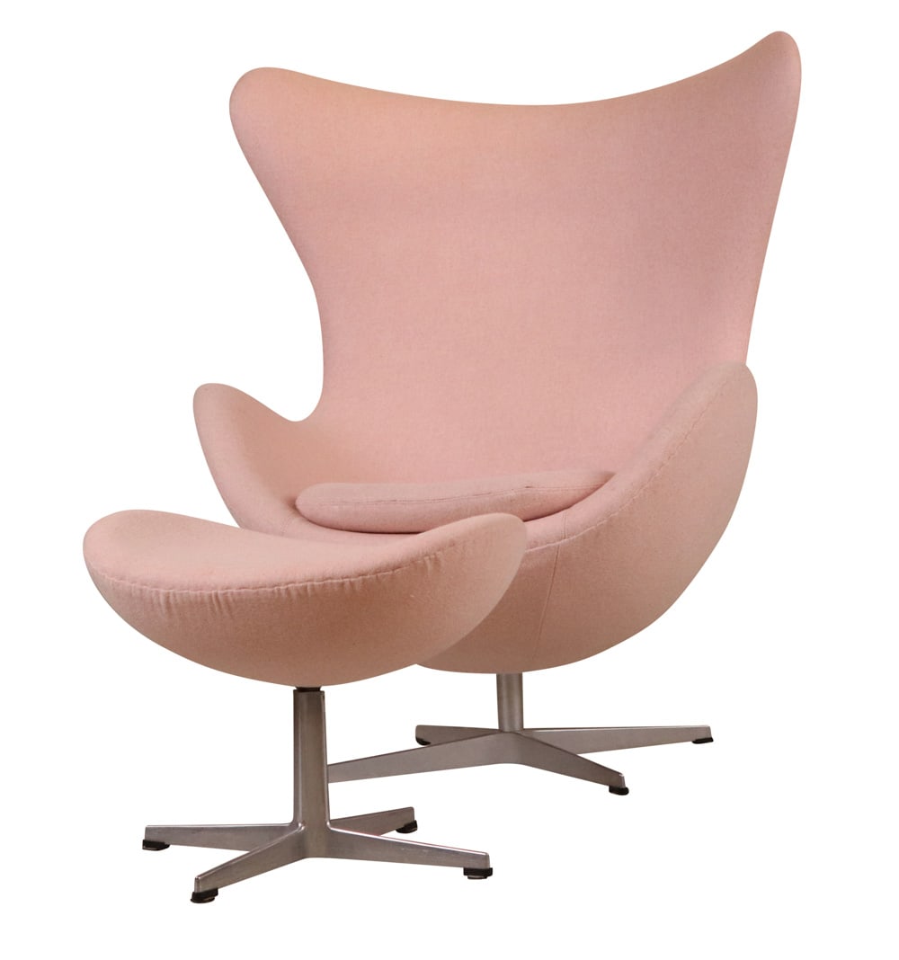 Fritz Hansen/Arne Jacobsen Egg Chair & Ottoman: With pink upholstery. Chair: 42"h Ottoman: 16-1/2"h x 21-1/2"w x 15-1/2"d