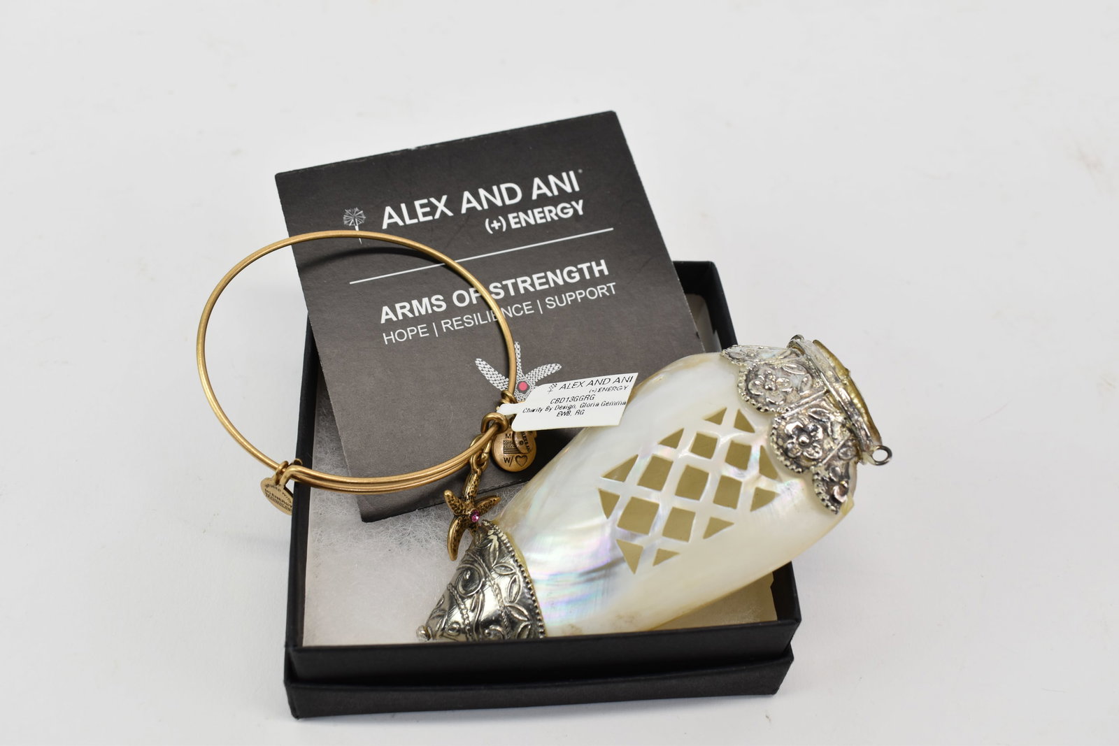 Vintage Abalone Shell and Silvered Scarf Holder: Vintage Abalone Shell and Silvered Scarf Holder Vintage Abalone Shell and Silvered Scarf Holder. Used condition, 3 3/4" tall x 2" x 1". Together with a Alex and Ani Braclet.