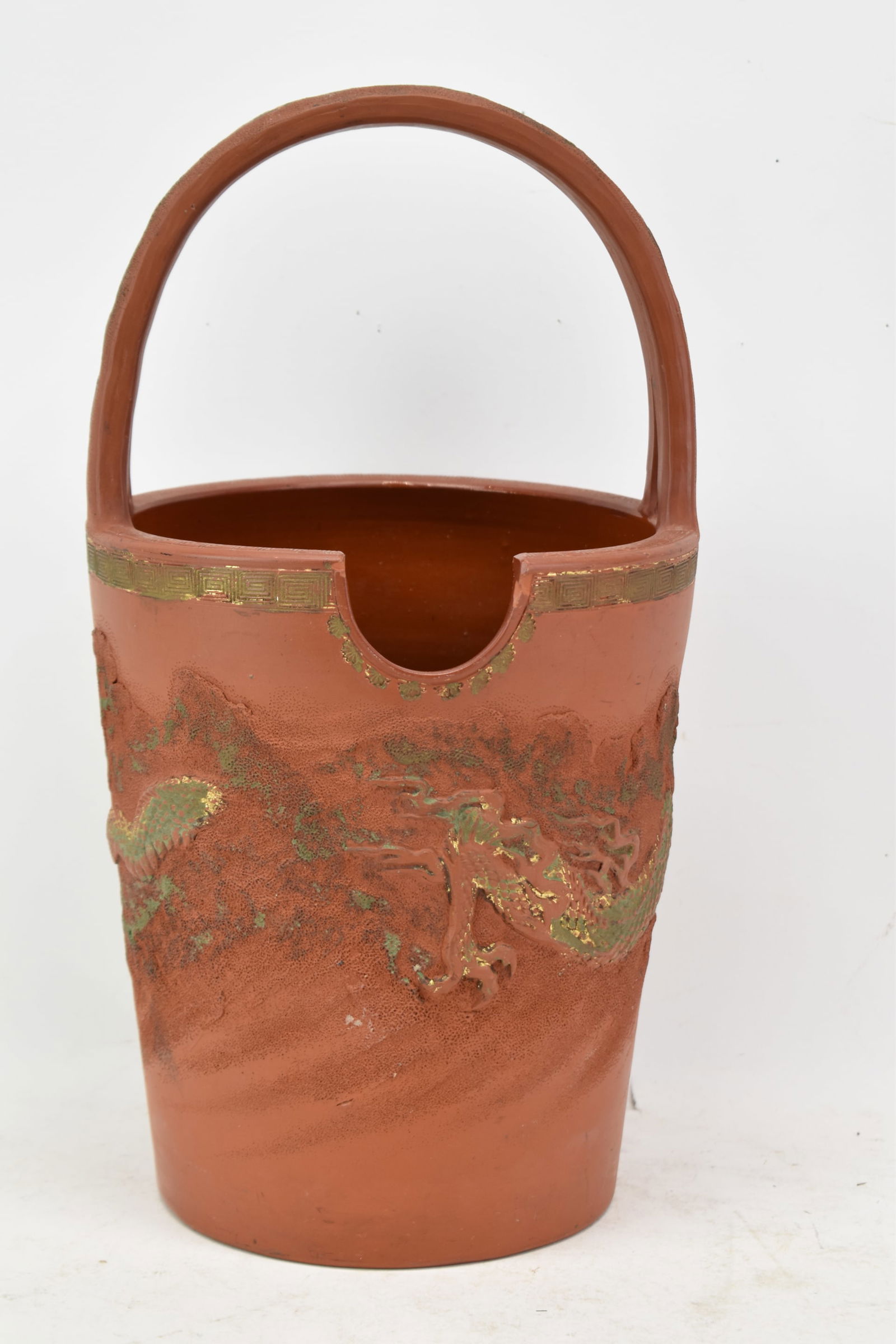 Asian Style Redware Handled Basket: Asian Style Redware Handled BasketAsian Style Redware Handled Basket having gilt dragon decoration. Used condition, chips, wear, 15" tall x 8" x 7 3/4"
