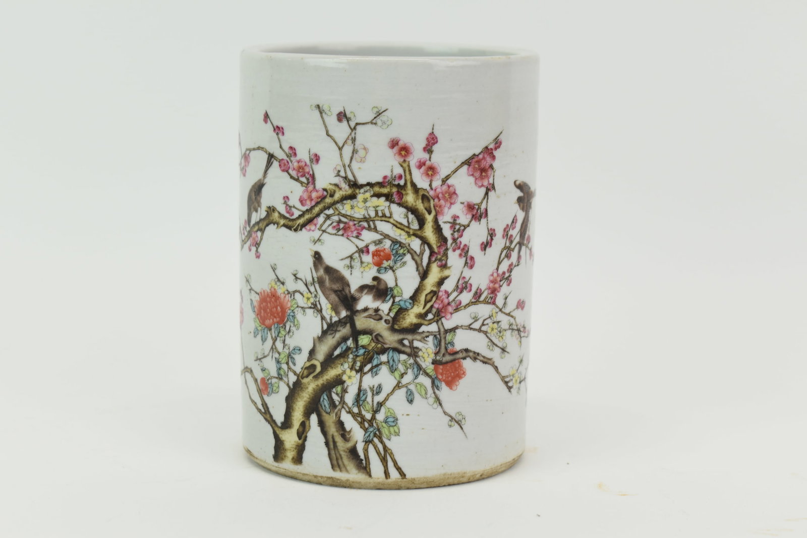 Chinese Enamel Bird and Tree Decorated Brush Pot: Chinese Enamel Bird and Tree Decorated Brush Pot Chinese Enamel Bird and Tree Decorated Brush Pot. Used condition, flea bite to rim. 4" tall x 2 7/8" diameter