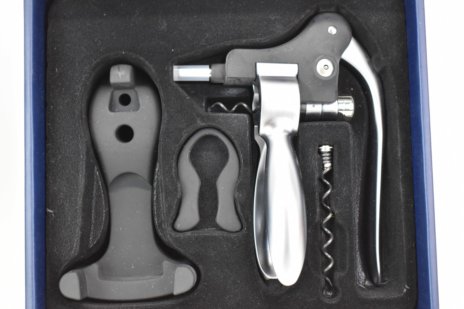 Brookstone Connoisseurs Wine Opener & Foil Cutter: Brookstone Connoisseurs Wine Opener & Foil Cutter Brookstone Connoisseurs Wine Opener new in original box with original packaging, includes stand, foil cutter, and instructions; new condition, some we