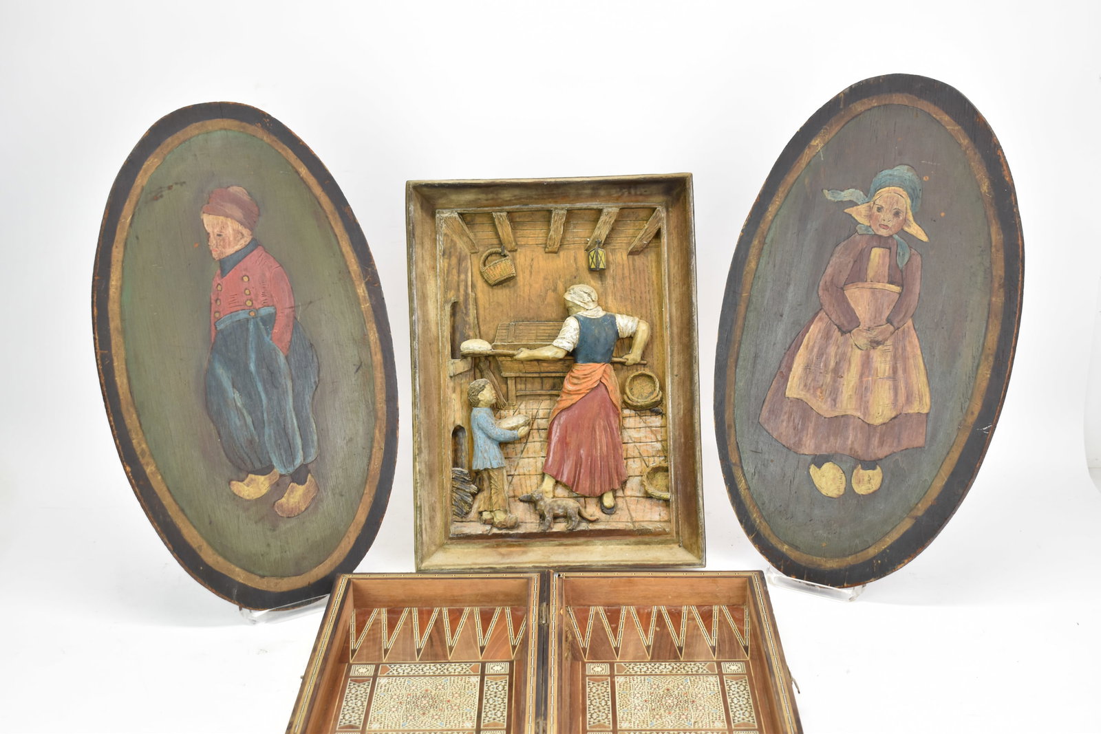 Pair of Painted Wooden Dutch Style Portraits: Pair of Painted Wooden Dutch Style Portraits Pair of Painted Wooden Dutch Style Portraits. Together with a Dutch style plaque of bread maker and a Moroccan style games box. Used condition, wear, worn,