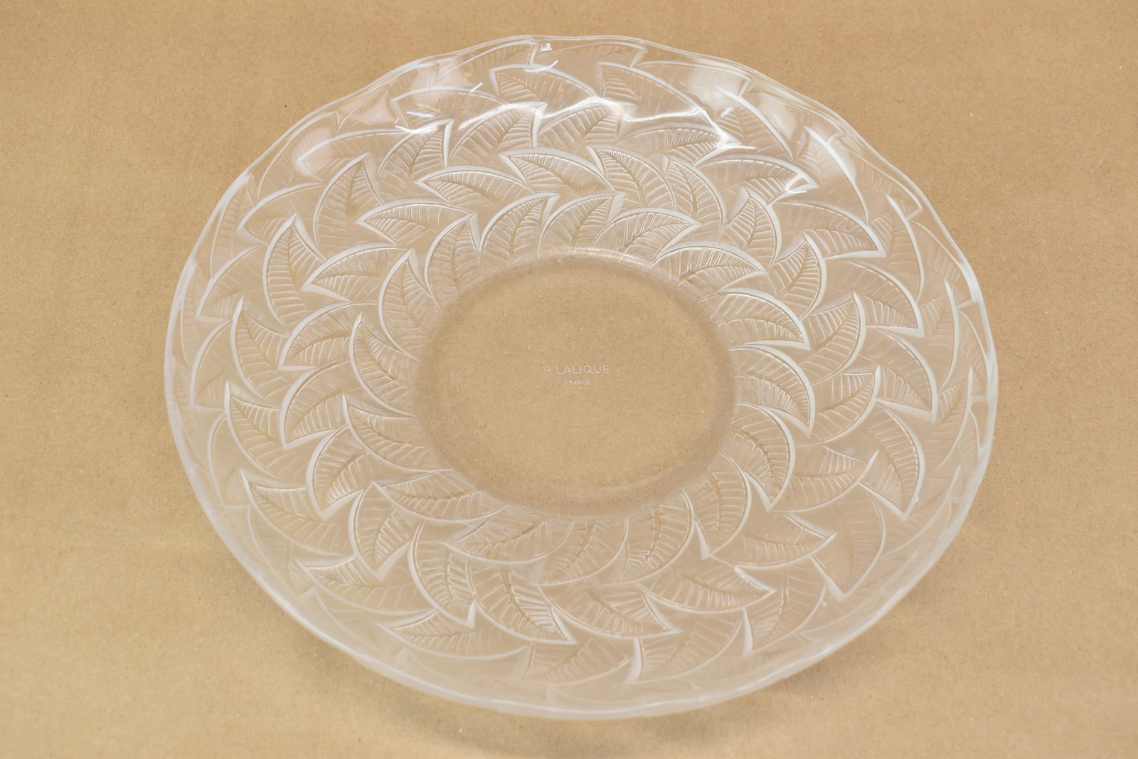 R. Lalique France Frosted Glass Center Bowl: R. Lalique France Frosted Glass Center Bowl R. Lalique France Frosted Glass Center Bowl, marked underside. Used condition, wear. 12-3/4"dia. x 2"h