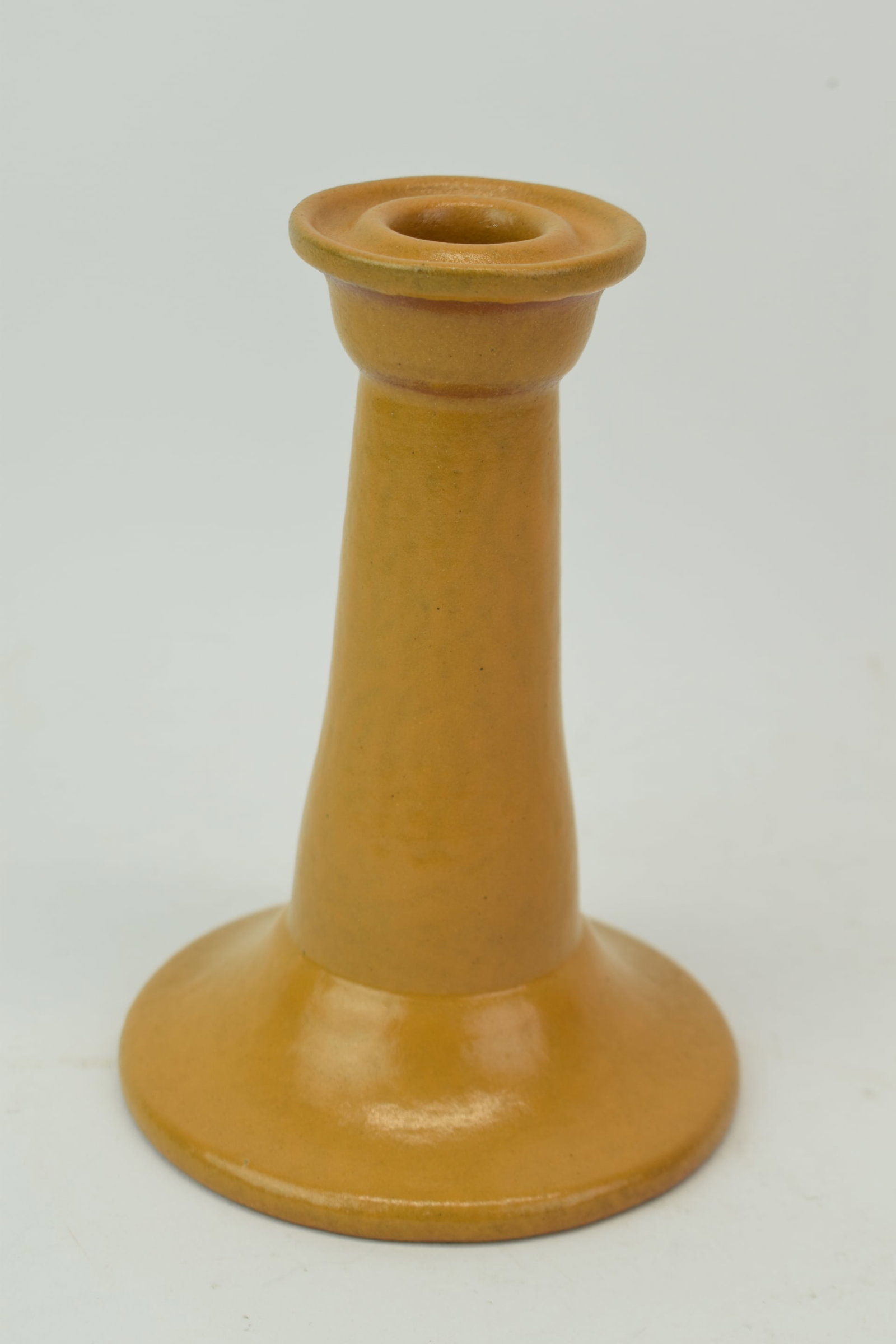 Yellow Glazed Paul Revere Pottery Boston Candlestick: Yellow Glazed Paul Revere Pottery Boston CandlestickYellow Glazed Paul Revere Pottery Boston Candlestick, part of the Saturday Evening Girls Club. Used condition 6 1/4" tall x 4 1/4" diamete
