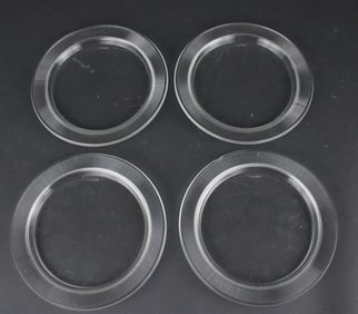 Four R. Lalique Colorless Glass Plates