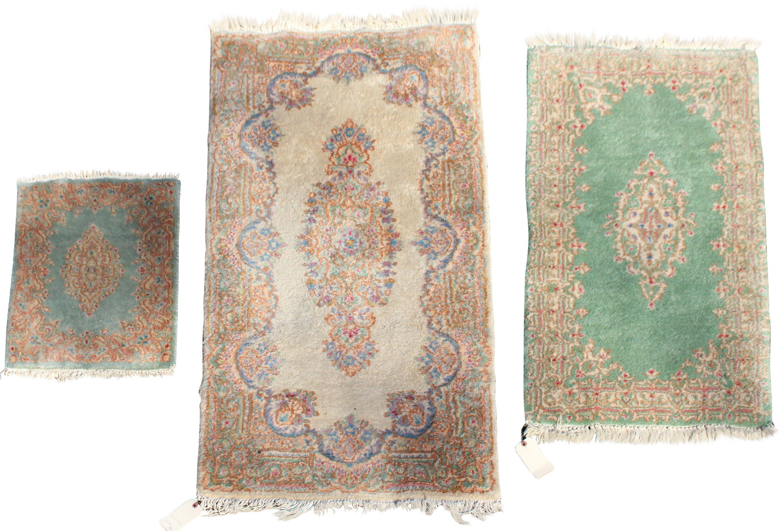 Three Kerman Rugs: Three Kerman Rugs Southeast Iran, 2nd 1/2 20th Century 4’l x 29” w, 5’l x 29” w, and 24” l x 18” w