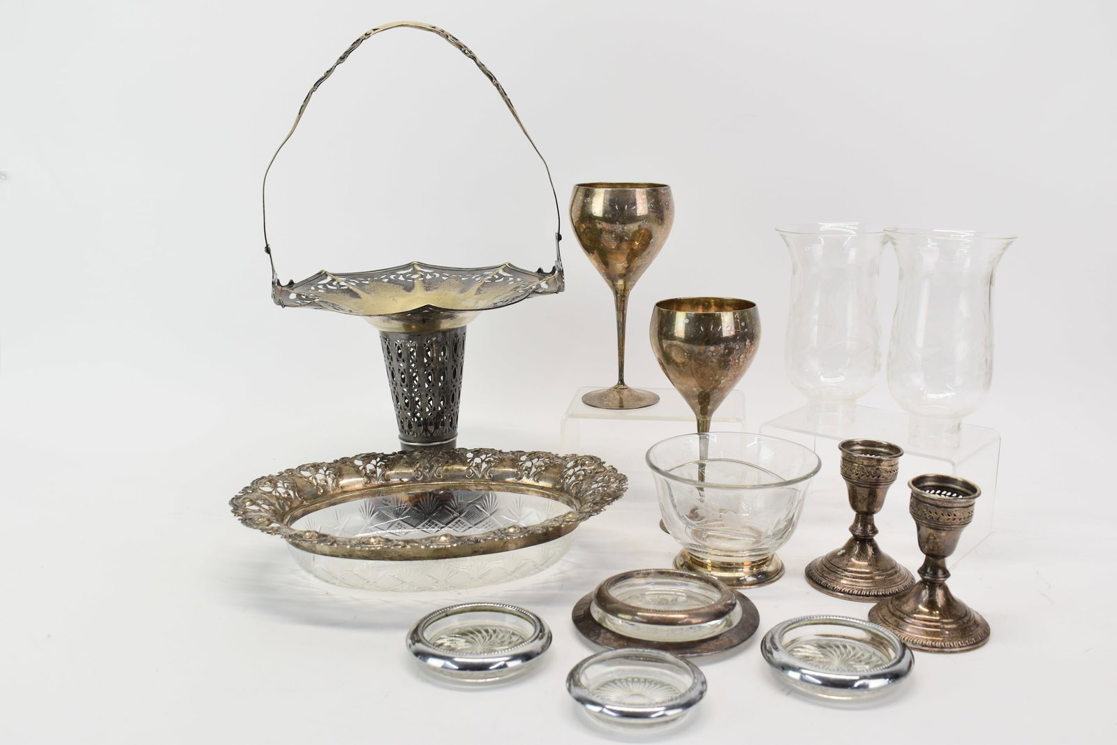 Group of Assorted Sterling Silver and Silverplated Table Articles: Group of Assorted Sterling Silver and Silverplated Table Articles Group of Assorted Sterling Silver and Silverplated Table Articles. Comprising pair of sterling candlesticks with glass shades, sterlin
