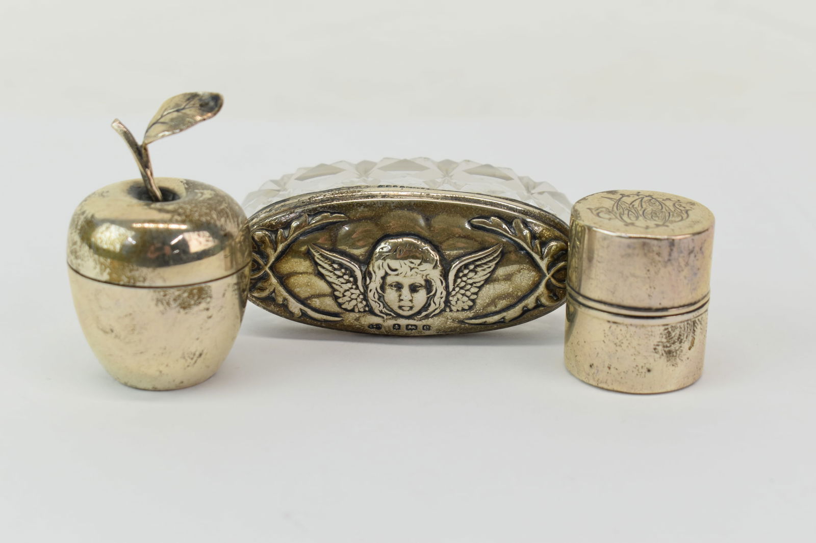 Two Sterling Silver Pillboxes and Dresser Box: Two Sterling Silver Pillboxes and Dresser BoxTwo Sterling Silver Pillboxes and one Dresser Box comprising one Tiffany & Co Makers sterling silver apple shaped pill box, one cylindrical sterling silver